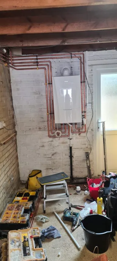 Combi pipework being run